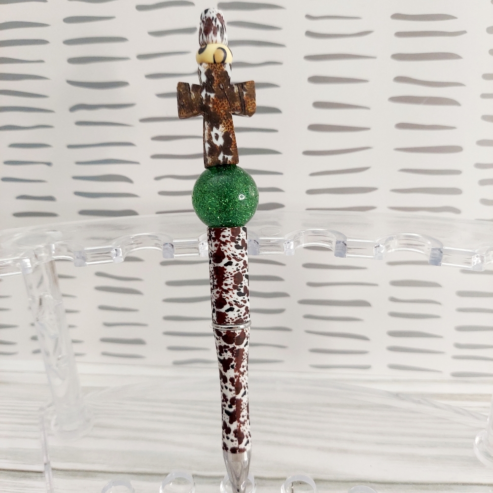 Handcrafted Cow Print Cross on a Cow Pen